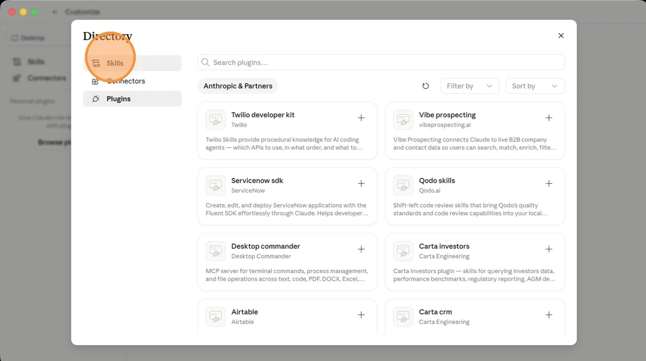 The Skills tab in the Claude app, adding skills like Desktop Commander and Twilio